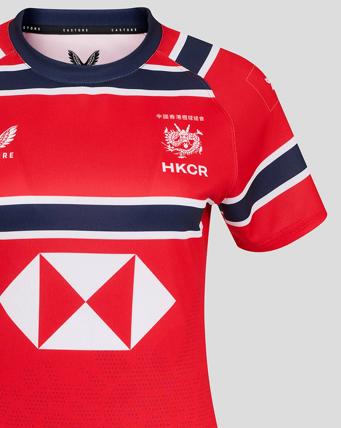 Shoulder and chest closeup of red HKCR Away 15s replica jersey showing team crest and bold navy white stripes
