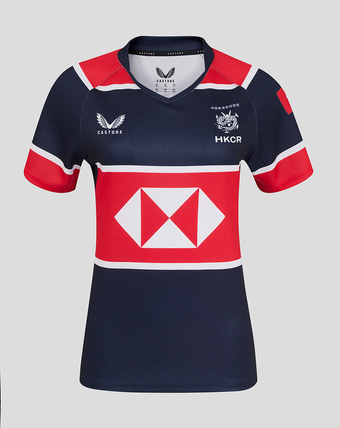 Front view of a navy HK 7s development replica jersey with red panels and a large white diamond emblem on the chest
