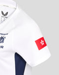 White HK7s away jersey sleeve close up with a red Hong Kong flag patch and HKCR crest visible on the chest.