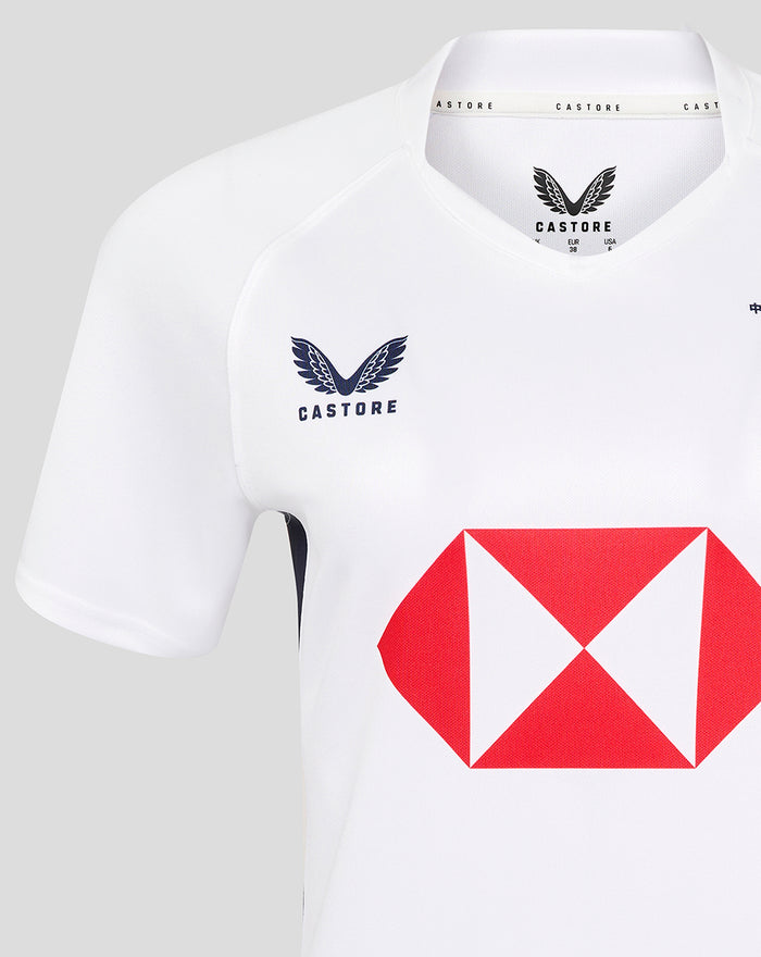 Close up of a white women's HK7s away replica jersey showing the Castore chest logo and large red HSBC diamond sponsor.