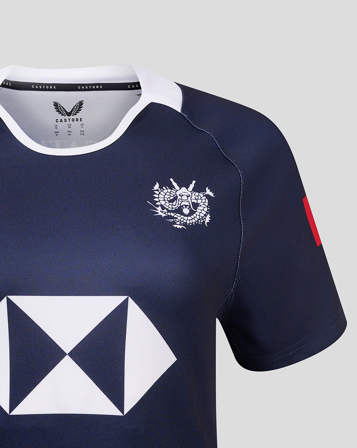 Navy women's home jersey close up with the white winged CASTORE logo on the chest and a red patch on the sleeve