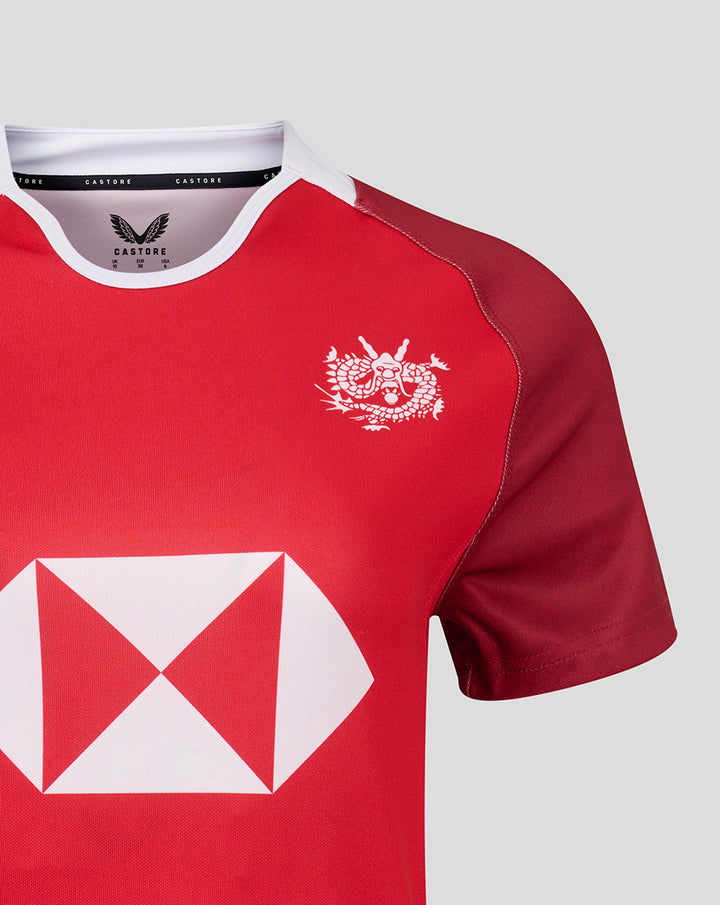 Front view of red HKCR women’s away jersey showing a white crest on the left chest and the large white diamond sponsor graphic
