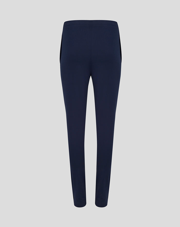 Back view of navy women’s HKCR training pants with an elastic waistband