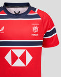 Front close up of HKCR Away jersey on red fabric with navy white stripes, crest HKCR and large diamond sponsor logo