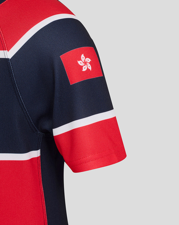 Shoulder close-up of HK7s development replica jersey with navy fabric and a red Hong Kong flag patch on the sleeve.