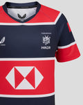 Front view of navy and red HK 7s jersey featuring a large red band with a white diamond sponsor graphic