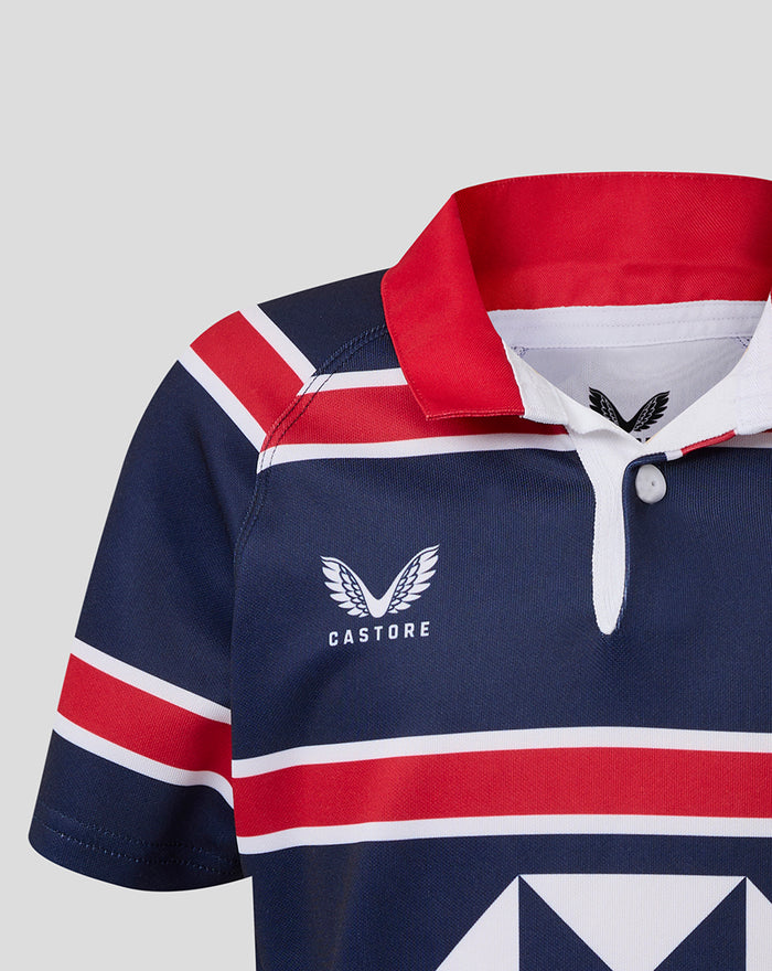 Close up of the HKCR Home jersey neck showing navy fabric red collar and white placket.