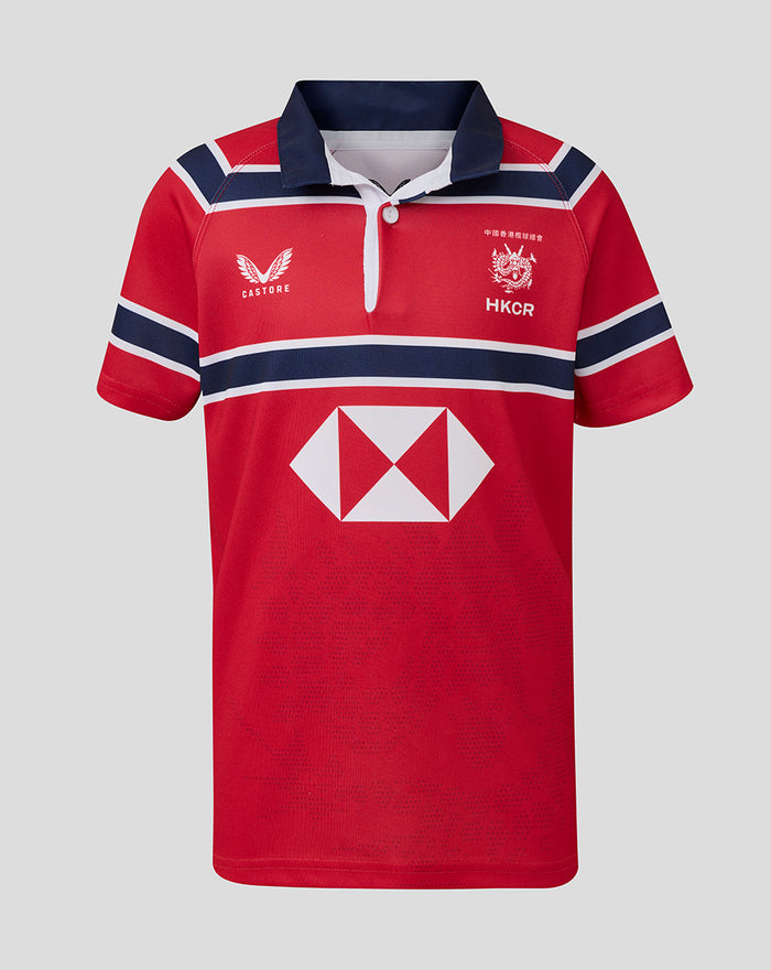 Red away rugby jersey with navy collar white placket and Castore logo beside HKCR crest