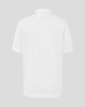 Back view of white graphic training polo with subtle jacquard pattern across the fabric.