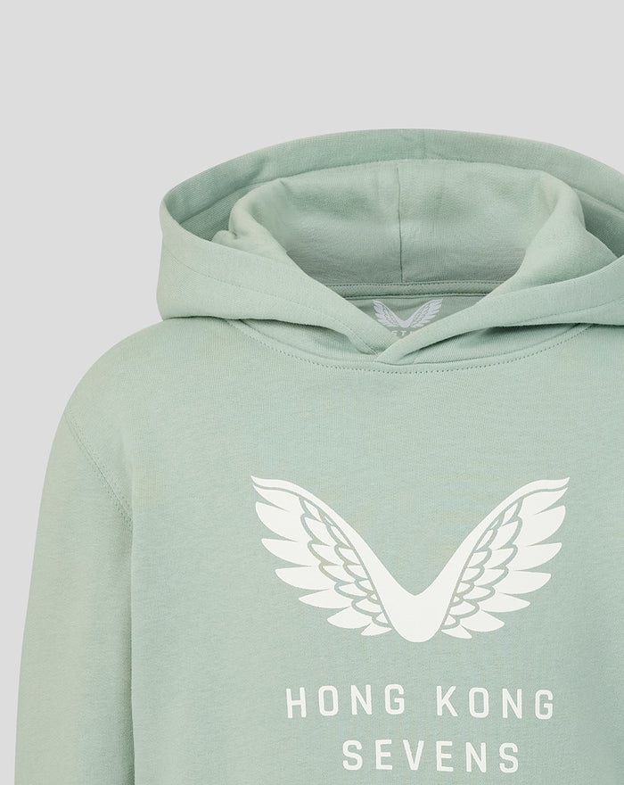 Close up of the Aloe Junior Big Wings Hoodie chest showing white wings graphic and Hong Kong Sevens branding