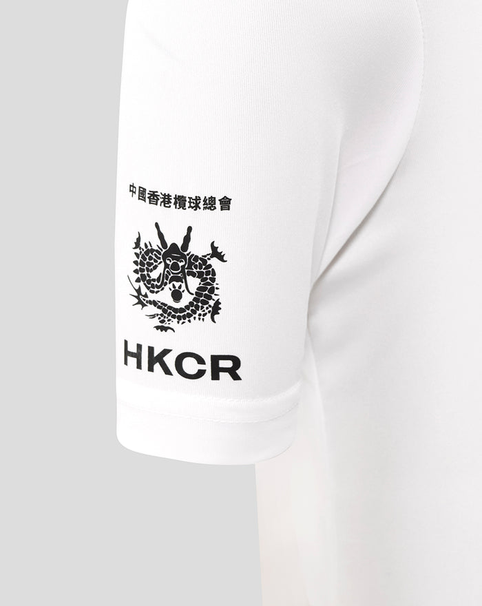 Close-up of white junior rugby tee sleeve featuring the HKCR emblem and Chinese characters.