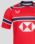Back view focusing on upper back with Cathay sponsor text and navy stripe details on shoulders