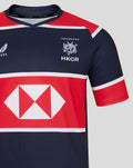 Close up of navy HK 7s replica jersey chest showing HKCR crest and a large red sponsor band.