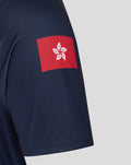 Close up of navy home jersey sleeve with a red square crest featuring a white dragon