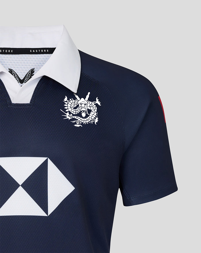 Navy Hong Kong Sevens home replica rugby jersey with white polo collar and white dragon crest on the chest.