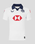 White away jersey with navy collar, navy dragon crest on the chest and red HSBC sponsor logo
