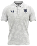 White graphic training polo front view with HKCR crest Castore logo and tonal jacquard pattern.