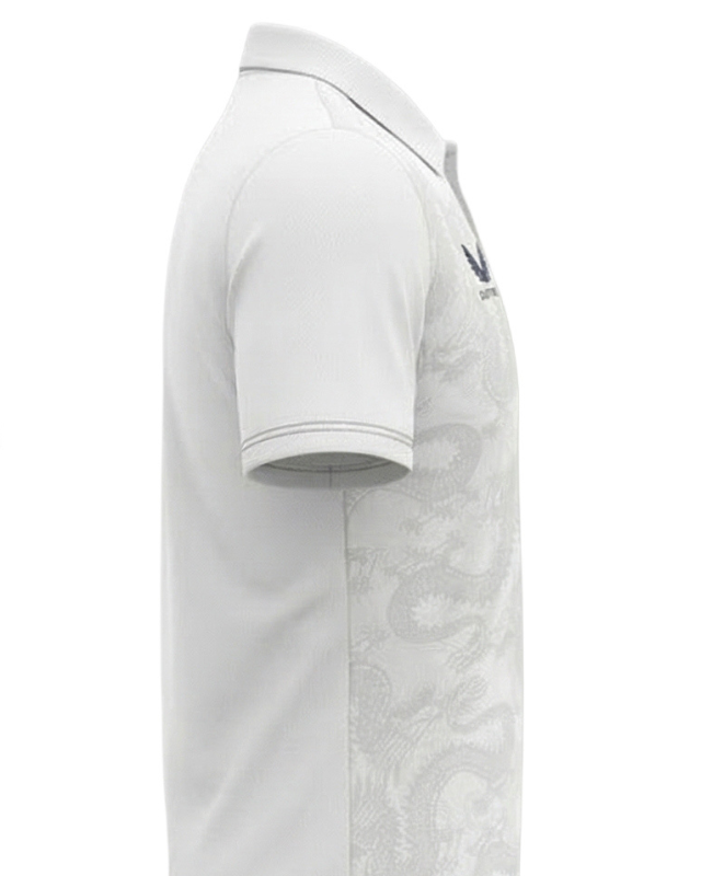 White graphic training polo shown in profile with subtle tonal jacquard texture and a tidy polo collar